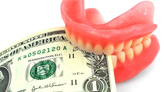 money in set of false teeth