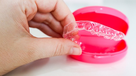 Invisalign in a pink case