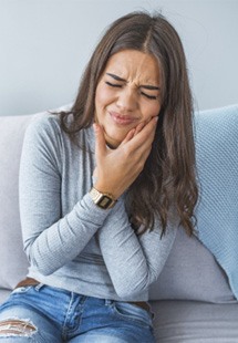 Closeup of woman experience toothache