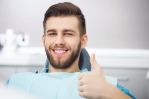 Man gives his Tulsa sedation dentist a thumbs up